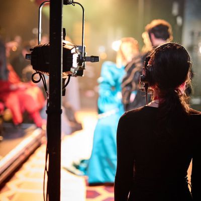 Stage Management student off stage overlooking production - Henry VIII, 2025